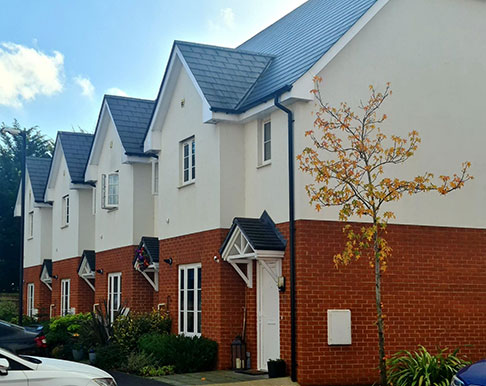 Image of the front of social housing as an example of work by roof joists specialists Merronbrook